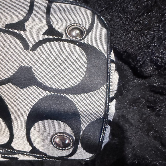 Coach Kiss-lock carryall in signature black print. See pictures
